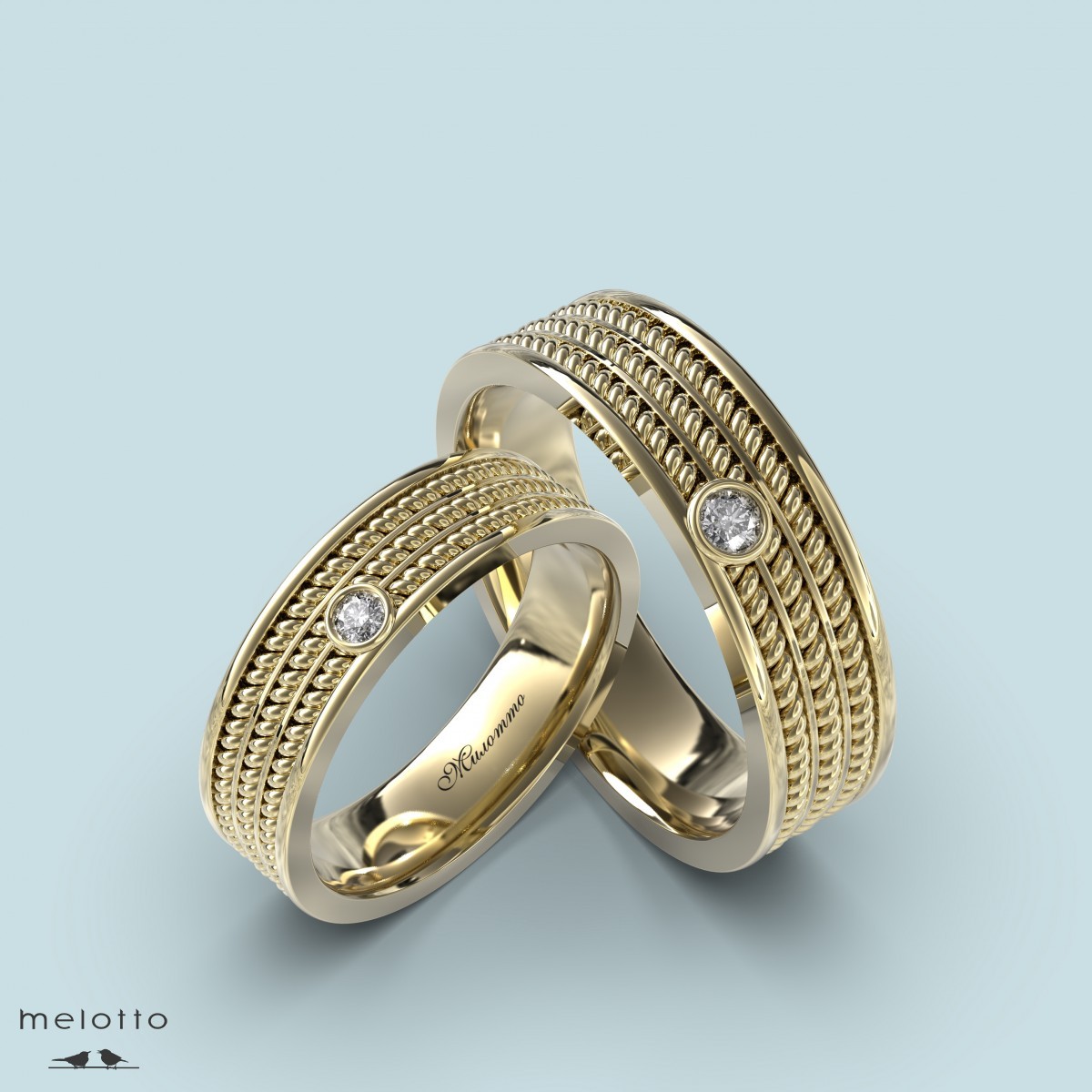 Обручальные кольца из желтого золота с витым узором