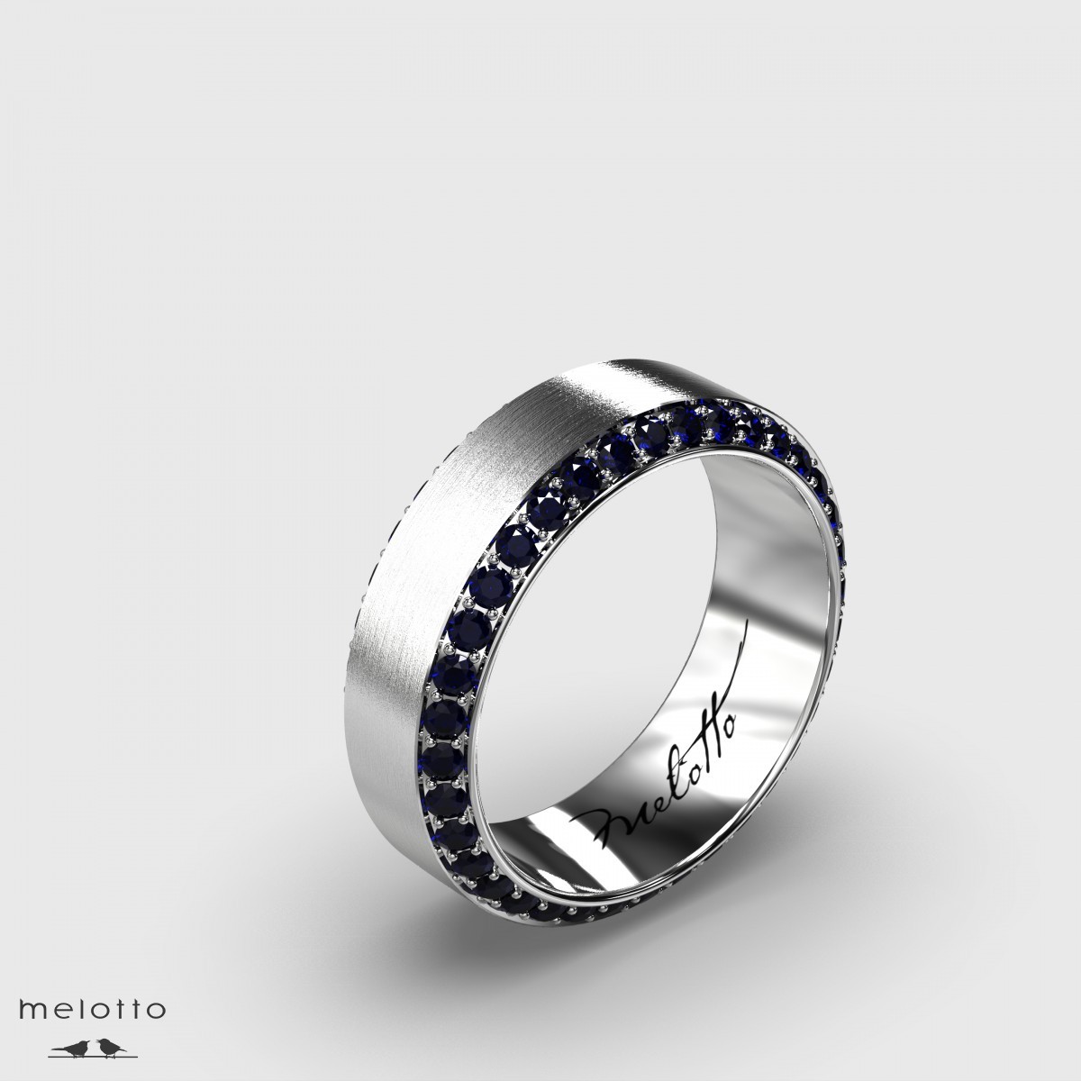 Мужское обручальное кольцо с синими сапфирами
