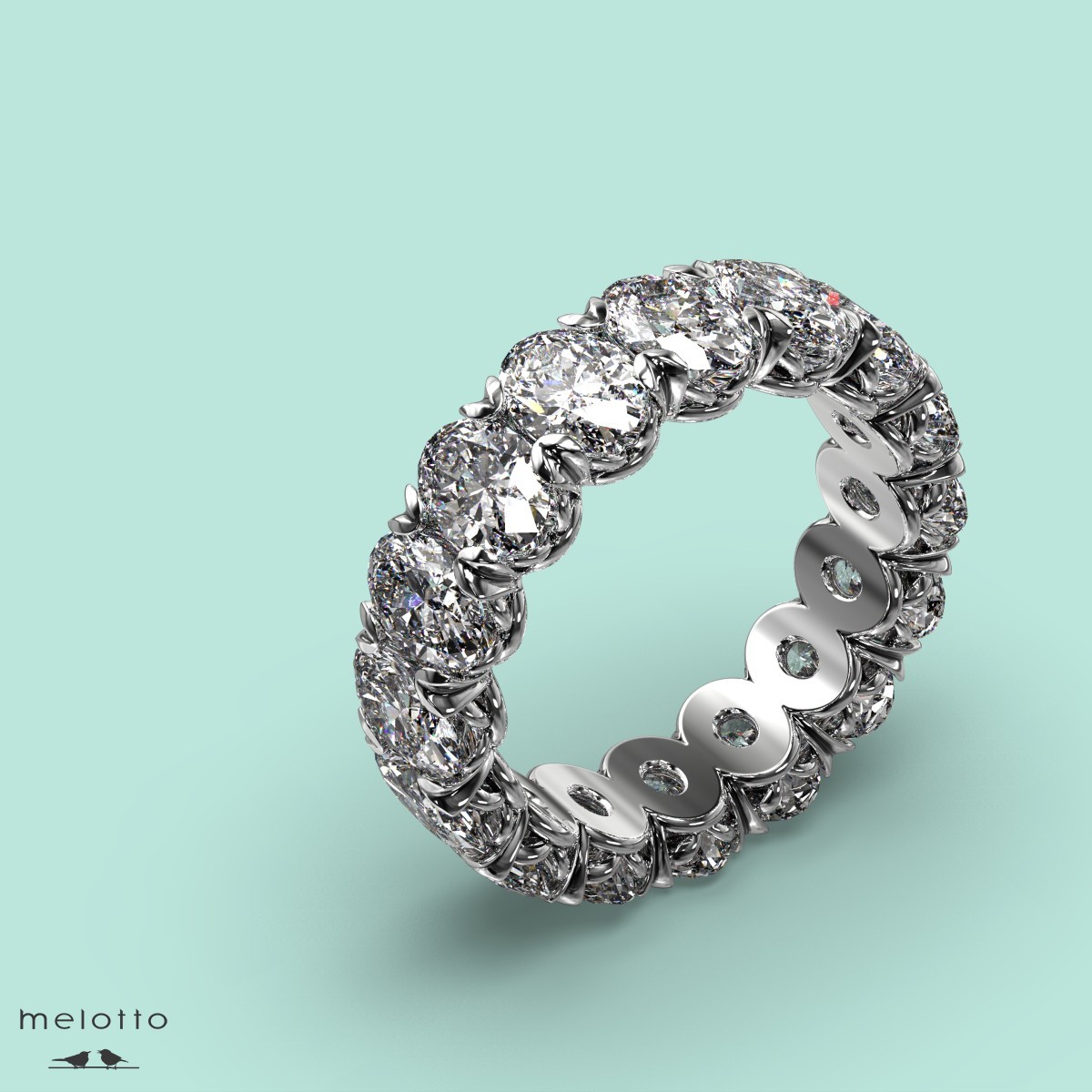 Обручальное кольцо из платины с овальными бриллиантами