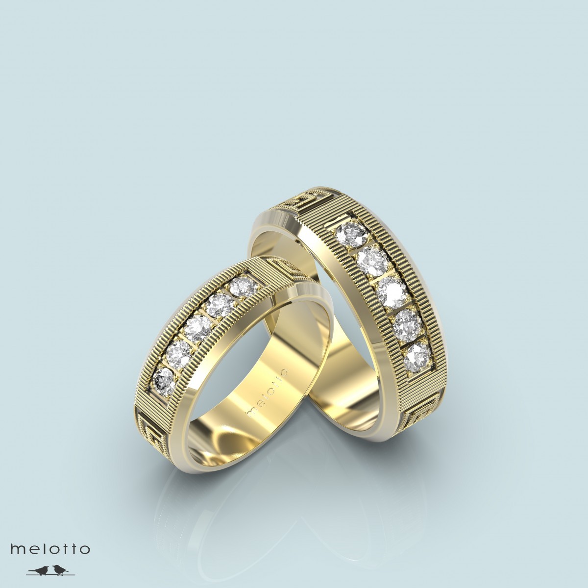 Обручальные кольца из желтого золота с бриллиантовой дорожкой