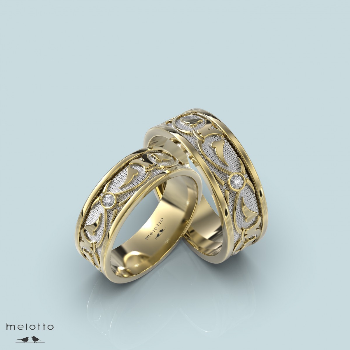 Обручальные кольца из желтого золота с одним бриллиантом