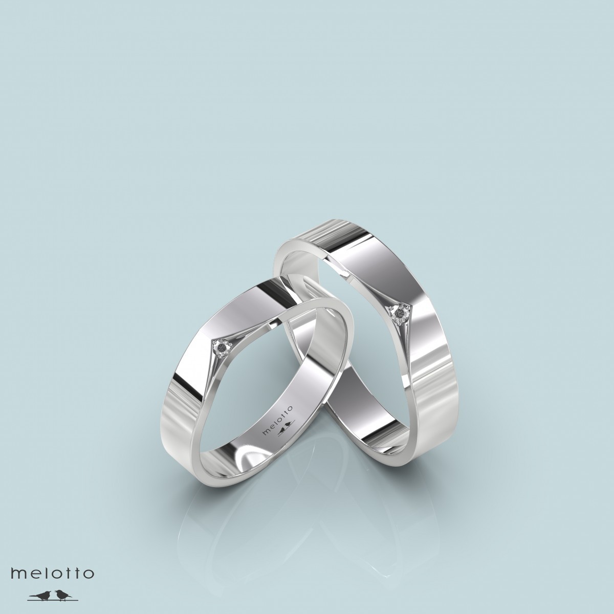 Простые обручальные кольца с бриллиантом