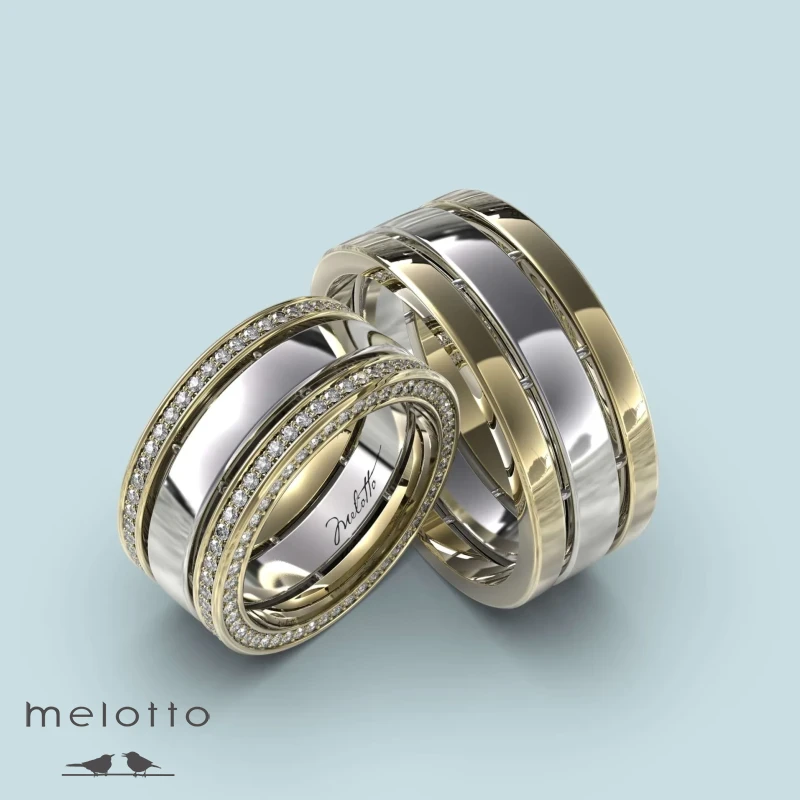 Обручальная пара колец «Hit» желтого и белого золота Обручальная пара колец «Hit» желтого и белого золота