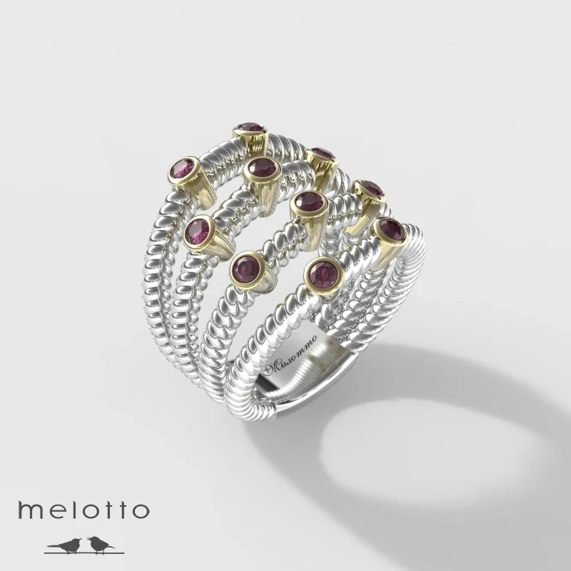 Женское витое кольцо из золота с рубинами Женское витое кольцо из золота с рубинами