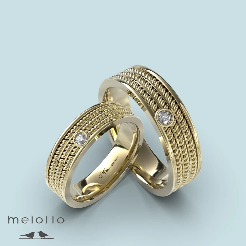 Обручальные кольца из желтого золота с витым узором Обручальные кольца из желтого золота с витым узором
