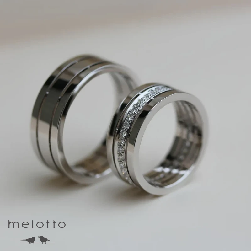 Массивные обручальные кольца из белого золота с бриллиантами