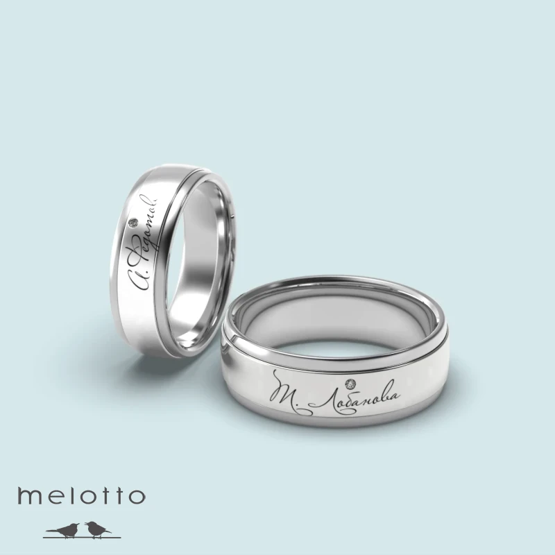 Обручальные кольца с подписью жениха и невесты Обручальные кольца с подписью жениха и невесты