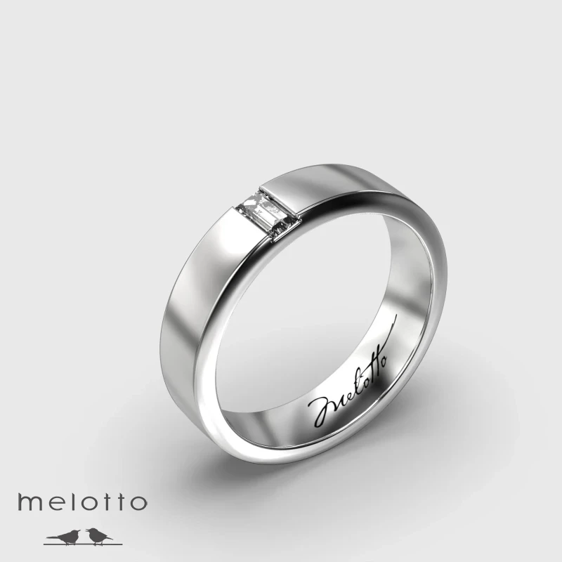 Вертикальное обручальное кольцо с одним бриллиантом багетной огранки