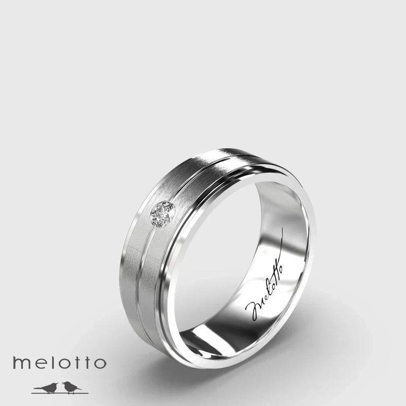 Элегантное обручальное кольцо из белого золота с матовым центром
