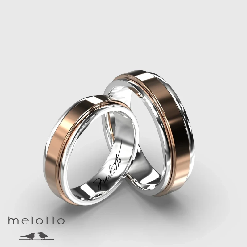 Вращающиеся обручальные кольца из белого и красного золота Вращающиеся обручальные кольца из белого и красного золота