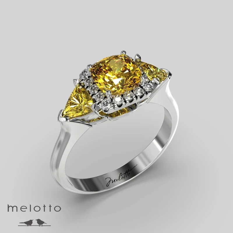 Кольцо с желтыми и белыми муассанитами Кольцо с желтыми и белыми муассанитами