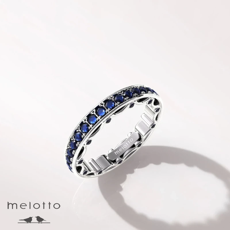 Женское обручальное кольцо с бриллиантами и сапфирами