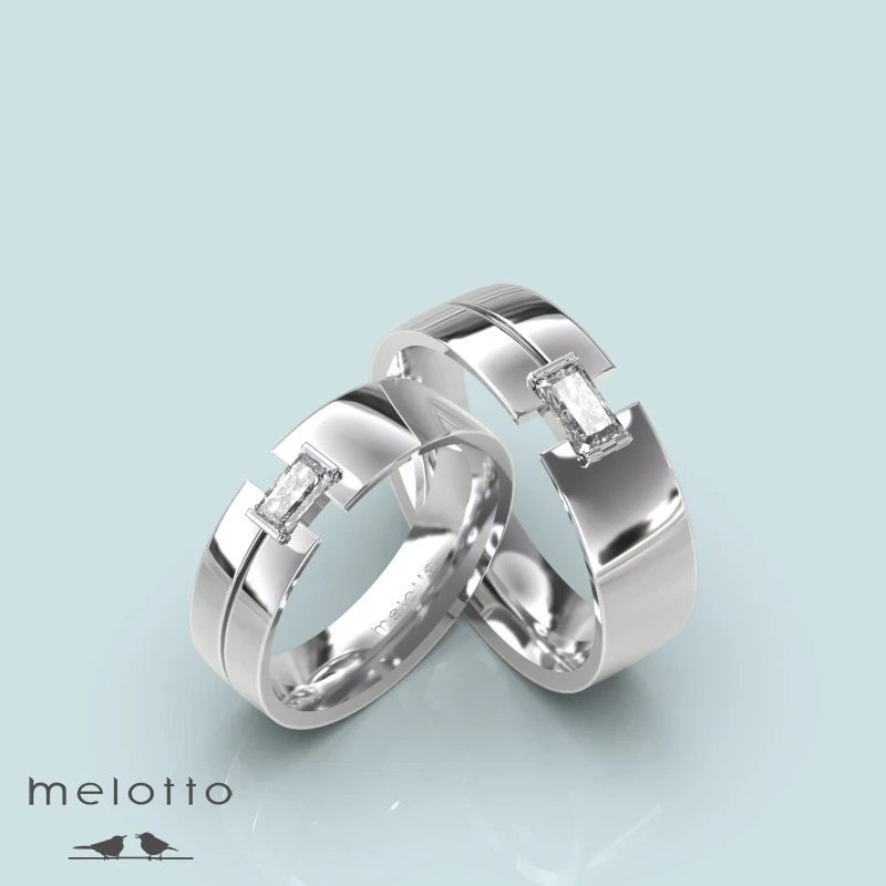 Классические обручальные кольца с бриллиантом огранки багет