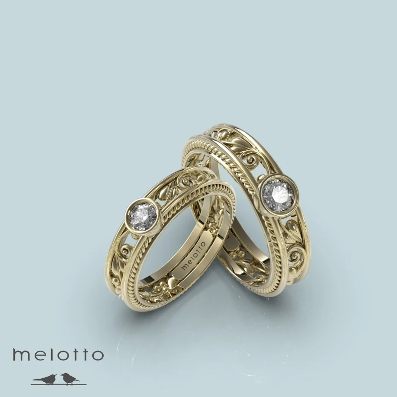 Ажурные обручальные кольца из желтого золота