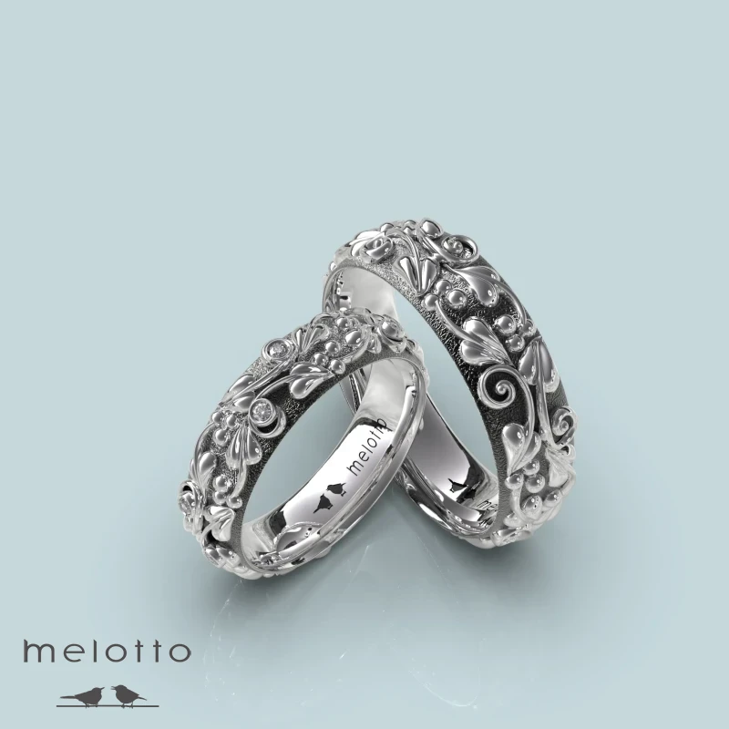 Обручальные кольца с объемным  цветочным узором