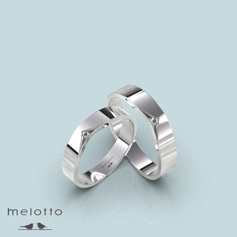 Простые обручальные кольца с бриллиантом