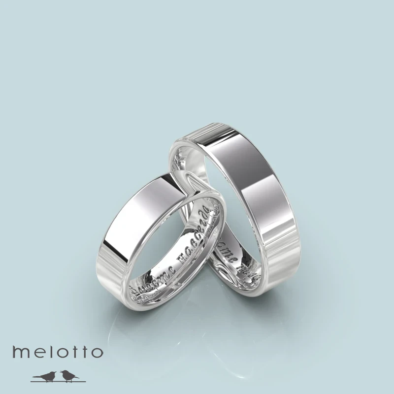 Обручальные кольца из белого золота с гравировкой даты Обручальные кольца из белого золота с гравировкой даты