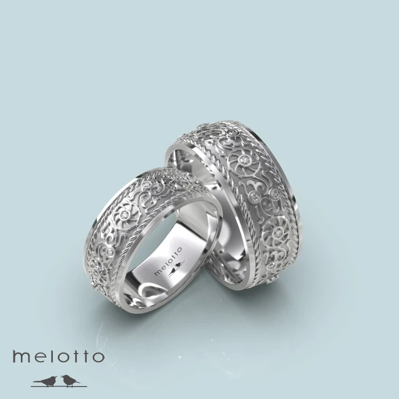 Обручальные кольца из белого золота с цветочным орнаментом Обручальные кольца из белого золота с цветочным орнаментом