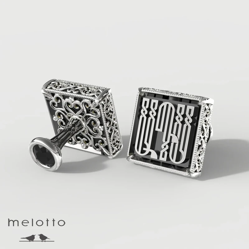 Запонки из золота с черным бриллиантом Запонки из золота с черным бриллиантом