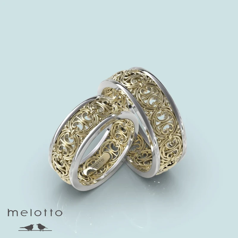 Обручальные кольца из белого и желтого золота Обручальные кольца из белого и желтого золота