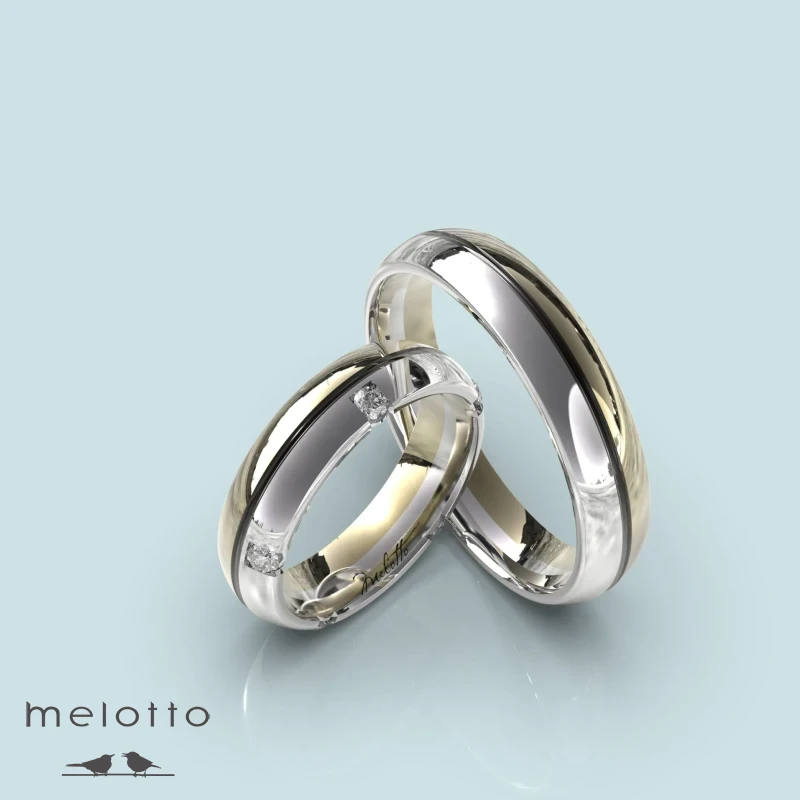 Необычные двухцветные обручальные кольца Необычные двухцветные обручальные кольца