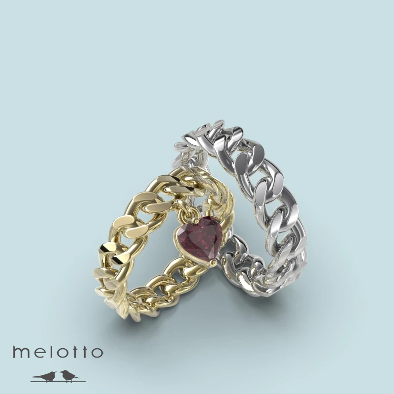 Обручальная пара колец с рубиновым сердцем