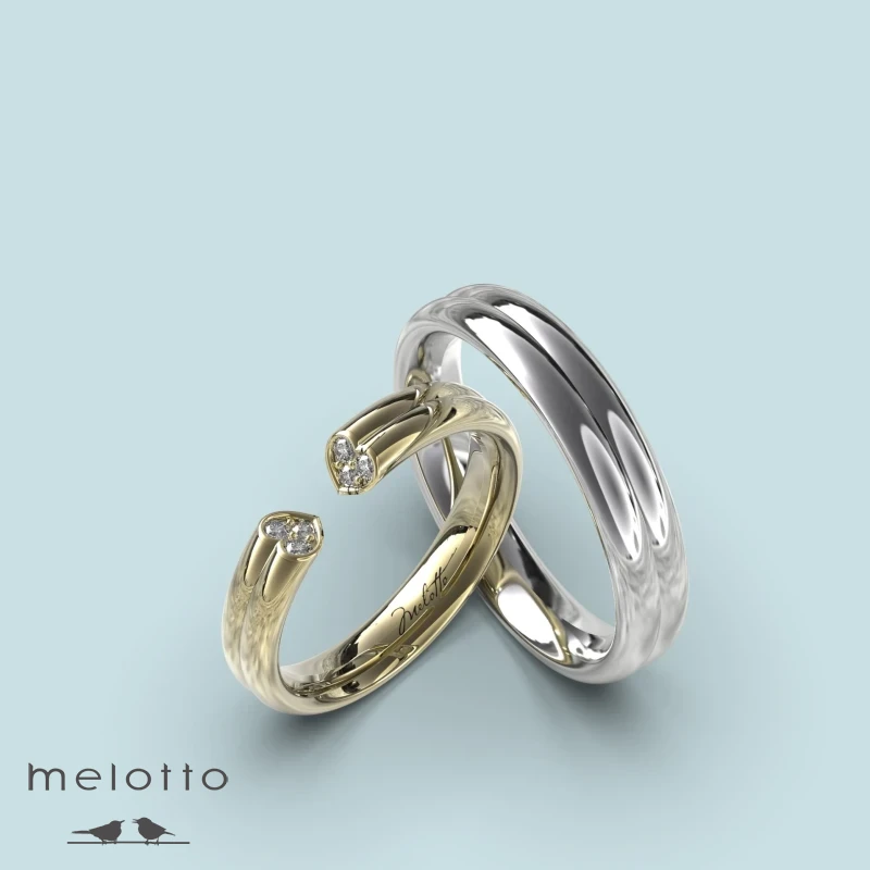 Обручальная пара из белого и желтого золота Обручальная пара из белого и желтого золота