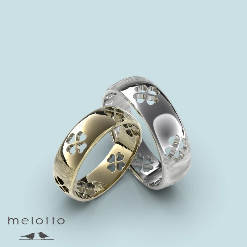 Обручальная пара колец с клевером