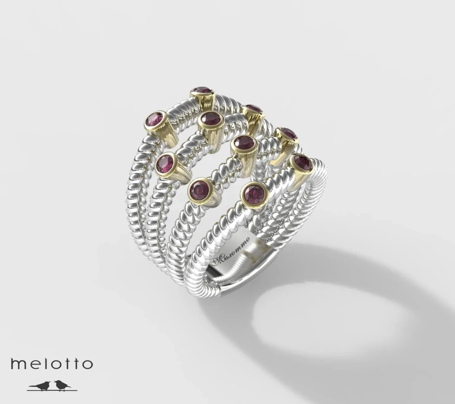 Женское витое кольцо из золота с рубинами