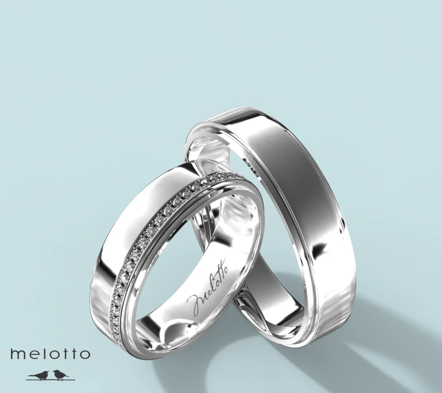 Геометрическая пара обручальных с бриллиантами