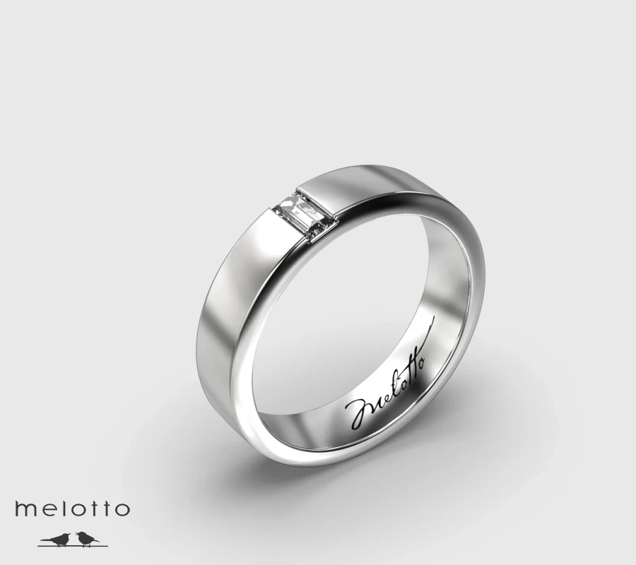 Вертикальное обручальное кольцо с одним бриллиантом багетной огранки