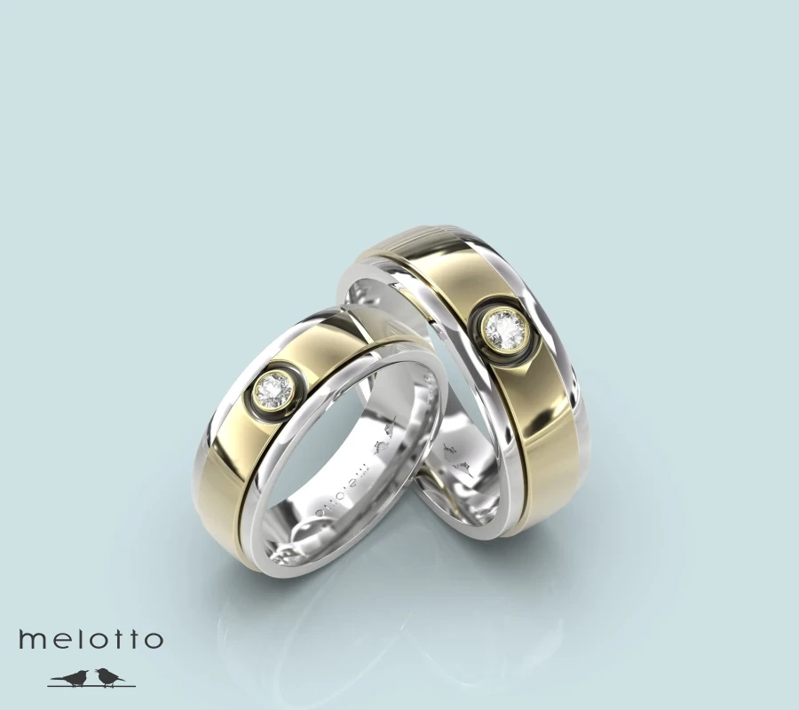 Классические обручальные кольца с бриллиантом