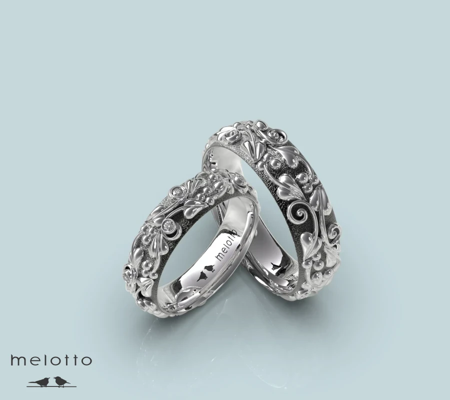 Обручальные кольца с объемным  цветочным узором