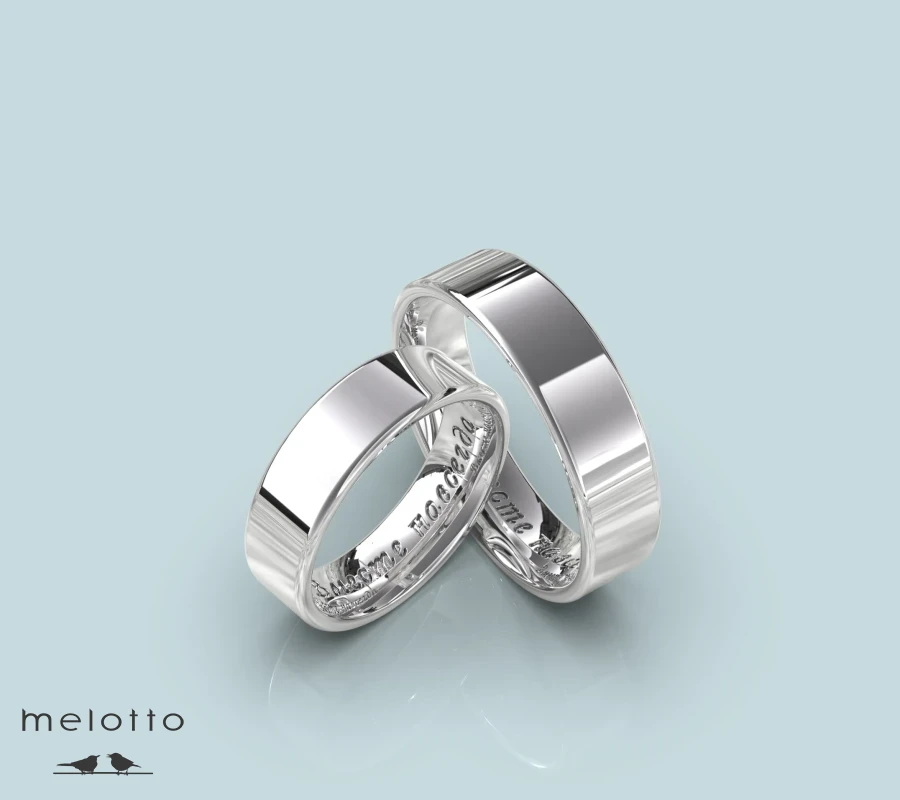 Обручальные кольца из белого золота с гравировкой даты