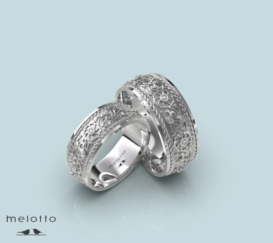 Обручальные кольца из белого золота с цветочным орнаментом