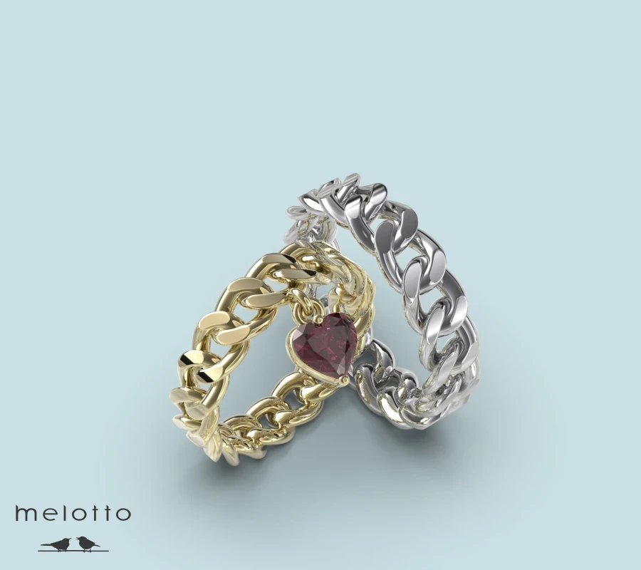 Обручальная пара колец с рубиновым сердцем