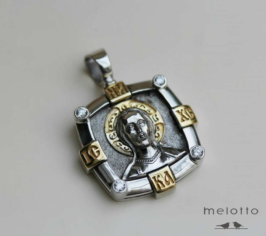 Серебряная нательная иконка с позолотой