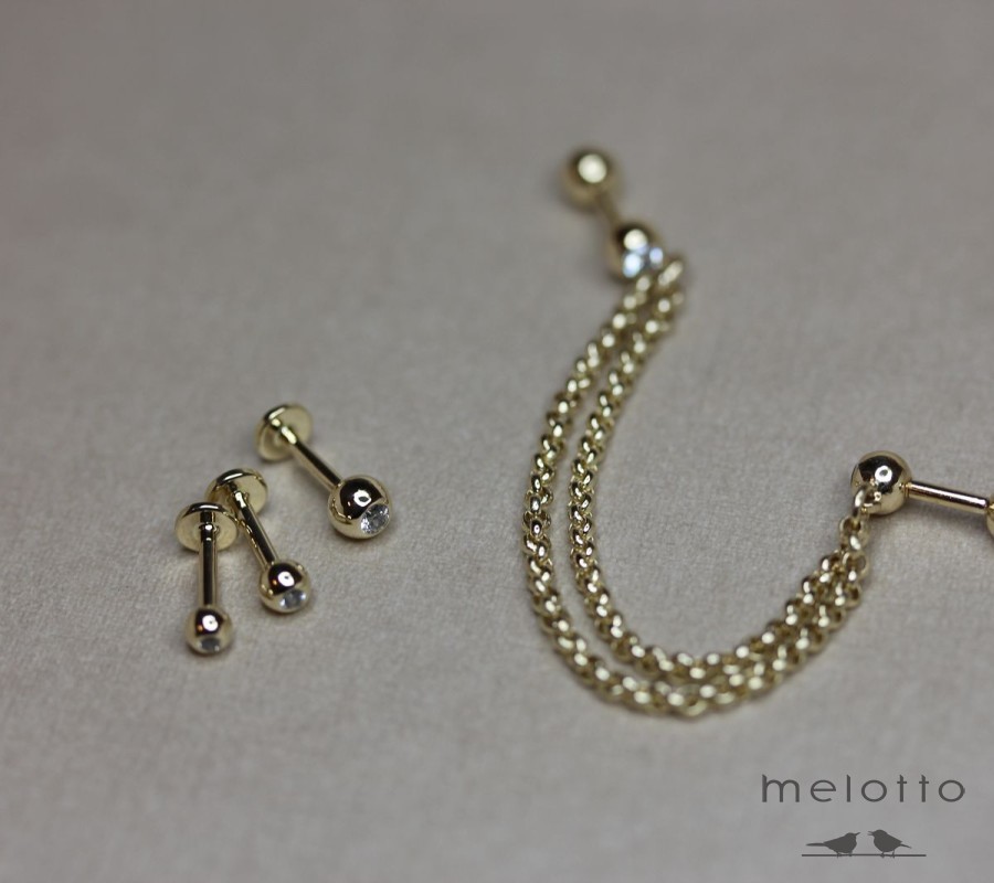 золотой пирсинг