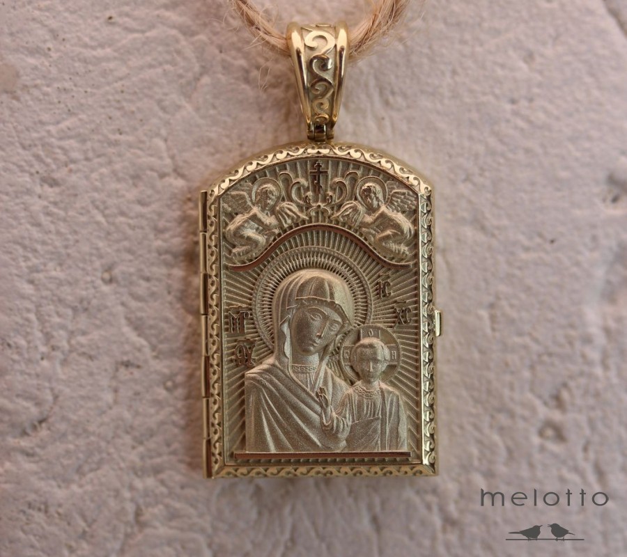 открывающийся медальон с ликом святого