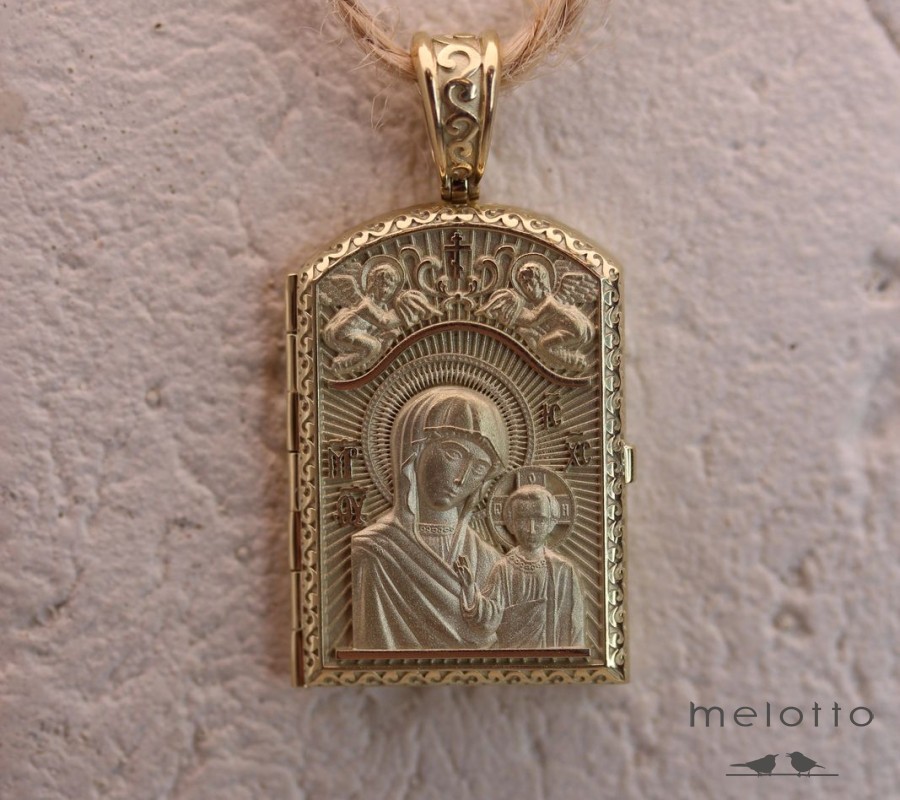 открывающийся медальон с ликом святого