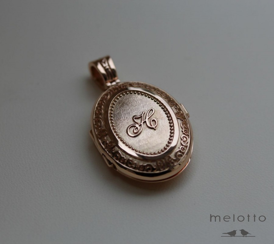 Медальон из золота под закладку